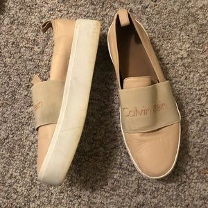 Calvin Klein beige platform slide ons